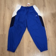 Nike Oversized Fit spodnie nylonowe Y2K L nowe z metką Dresy Nike Spodnie