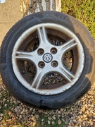 Opony całoroczne z felgami 185/60 R14 komplet - felgi oryginalne VW 1995