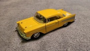 Samochodzik Chevrolet Bel Air 1957 – Kinsmart 1:40 – Żółty – Kolekcjonerski