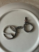 Brylok do kluczy Lacoste