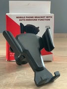 Uchwyt samochodowy do kratki nawiewu.