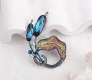 Broszka metalowa nietuzinkowy kwiat / liść multikolor niebieski 