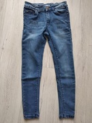 Spodnie dziewczęce r.128, pas max 68 cm