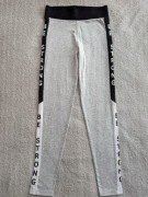 Szare bawełniane spodnie legginsy George napis Strong 146 - 152