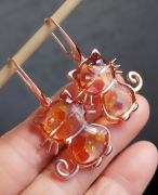 Urocze kolczyki. Kotki. Bursztyn