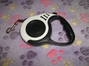 Smycz automatyczna z blokadą ,taśma mocna.długość trzy metry.