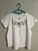 Biały t-shirt z kwiatowym motywem Quiosque