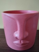 Pomarańczowa duża doniczka/ osłonka na kwiaty  twarz