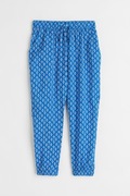 H&M Spodnie Joggersy Tkaninowe Niebieskie Wzór Rozmiar 122