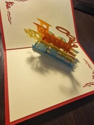 Karta urodzinowa/ świąteczna ze złotą kopertą i pociągiem w środku 3D