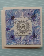 Kartka komunijna ręcznie wykonana z ręcznie malowanymi kwiatami 