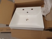 Umywalka wpuszczana w blat z konglomeratu