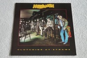MARILLION - CLUTCHING AT STRAWS