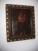 Portret mnicha przy świecy