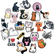 Przypinki do butów charms piny ozdoby zawieszki kotki 23 szt 