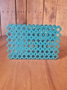 zielony metalowy serwetnik