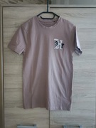 Jasnobrązowa koszulka z nadrukiem na plecach w kwiaty