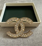 Broszka cyrkonia złota