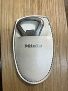 otwieracz do kapsli butelek w etui MIELE, też jako łyżka do butow