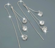 Efektowne kolczyki z tańczącą cyrkonią – lekkość i elegancja 