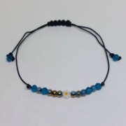 Bransoletka ręcznie robiona niebieska z białym kwiatkiem