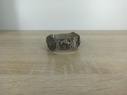 Bransoleta metalowa z tłoczonym wzorem