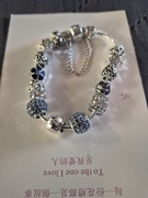 Bransoletka z zawieszkami modułowymi 15 sztuk. Serce z napisem Love.