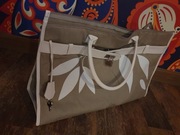 Torba beżowo-biała Clarins z kosmetyczką 