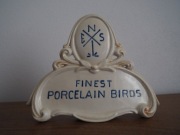 Karl ENS. Volkstedt. Szyld reklamowy. figurka, figura.