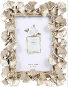 Ramka z żywicy na zdjęcia w kolorze złotym elegancka 21x17 cm