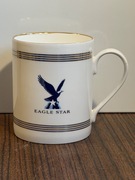 Kubek Eagle Star porcelana złocenia firmowy Anglia 
