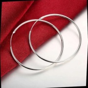 Nowe kolczyki koła 6 cm srebrne