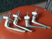 Klamki okienne w kolorze złotym