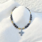 Bransoletka z krzyżykiem – elegancka biżuteria handmade