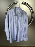 Jasno niebieska koszula firmy Eterna 