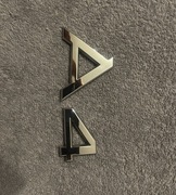 Znaczek emblemat Audi A4 tył oryginalny OEM