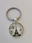 Brelok , breloczek , wypukłe szkło..