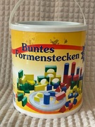 Kolorowe drewniane klocki – 65 elementów w wiaderku