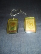 Dwa breloki reklamowe Pollena znaki zodiaku