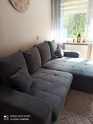 Szary narożnik z funkcją spania