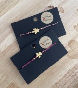 Bransoletka regulowana na sznurku Aniołek komunia