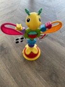 Tomy Lamaze Freddie zabawka na krzesełko