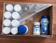 Mleko początkowe w butelce: 9 x humana 1 oraz 2 x bebilon 1