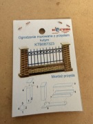 Kotebi KTB087323 - ogrodzenie murowane z przęsłem kutym.