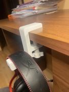 Bialy uchwyt na sluchawki regulowany