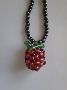 Naszyjnik handmade z plecioną malinką hematyt na wiosnę i lato