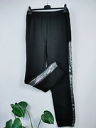 Czarne spodnie damskie wygodne ala dresowe na gumie długie srebrne cekiny