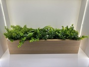 Ogród w doniczce . Kompozycja sztucznych roślin.