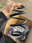 Sprężyna zawieszenia wraz z mocowaniami amortyzatora