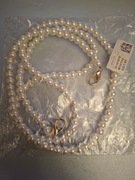 Do telefonu "sznurek" lub do kopertówki.Nówka.